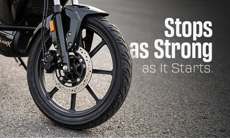 Revolt RV BlazeX Brakes and Tyres Explained: Disc Brakes, CBS and Grip
